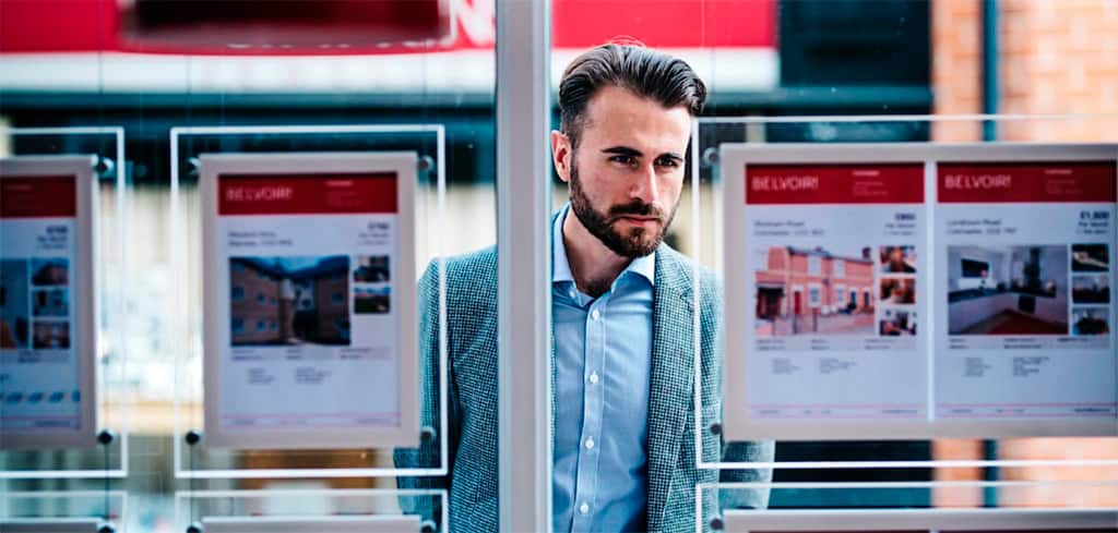 Man looking at Belvoir property listings